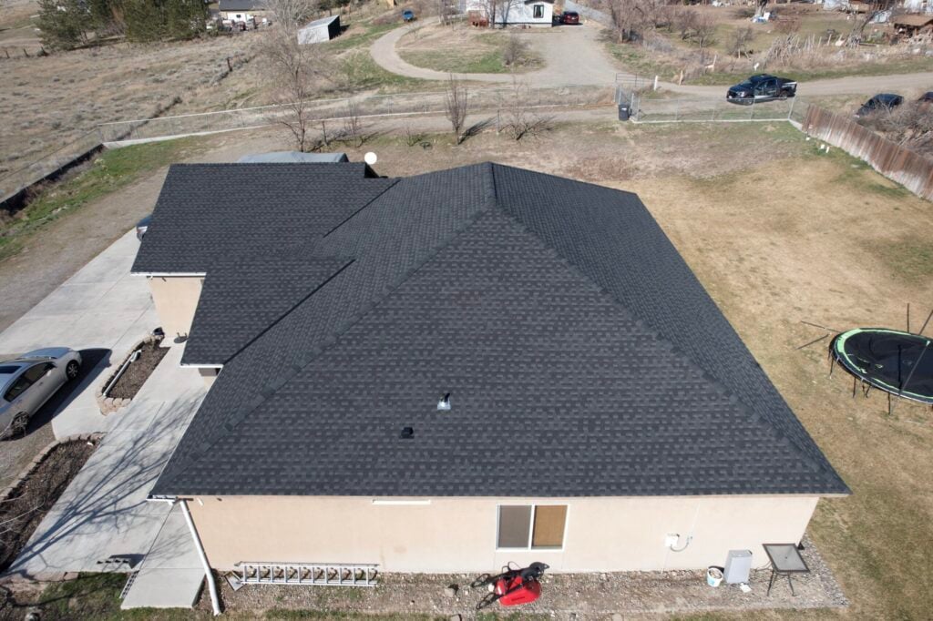 large tan home with black shingle roof in benton city washington