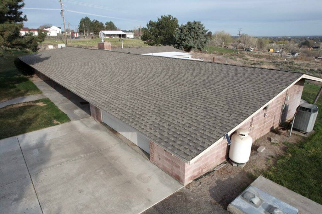 brick home with septic tank and new gaf hdz shingle roof in kennewick washington