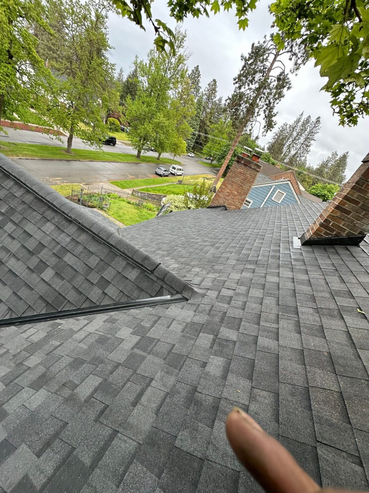 Alpine Roofing installs CertainTeed Landmark PRO Moire Black shingles on a home on West 21st Avenue in Spokane, WA.