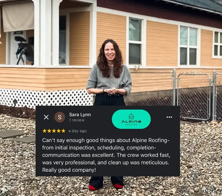An Alpine Roofing happy customer standing outside of her home.