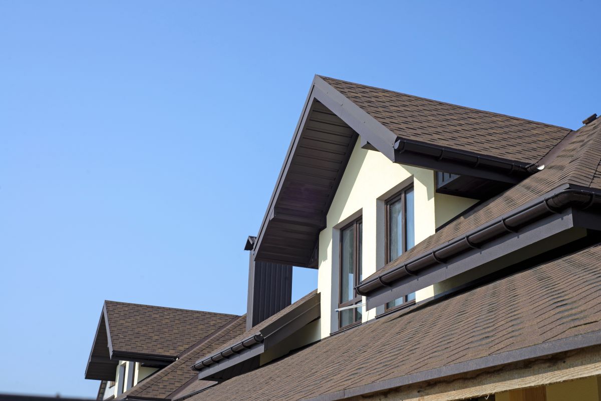 roof shingles against blue sky