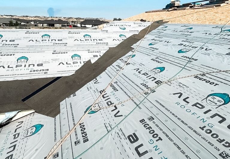 Roof being replacemed by Alpine Roofing