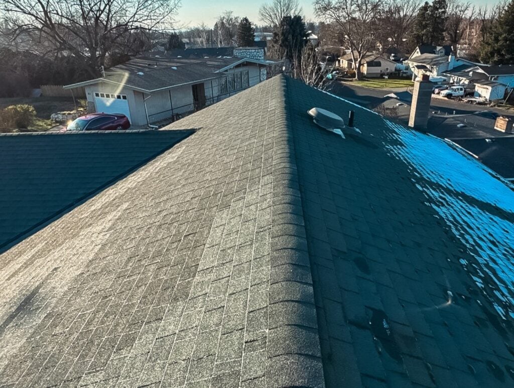 Close up of grey asphalt shingles