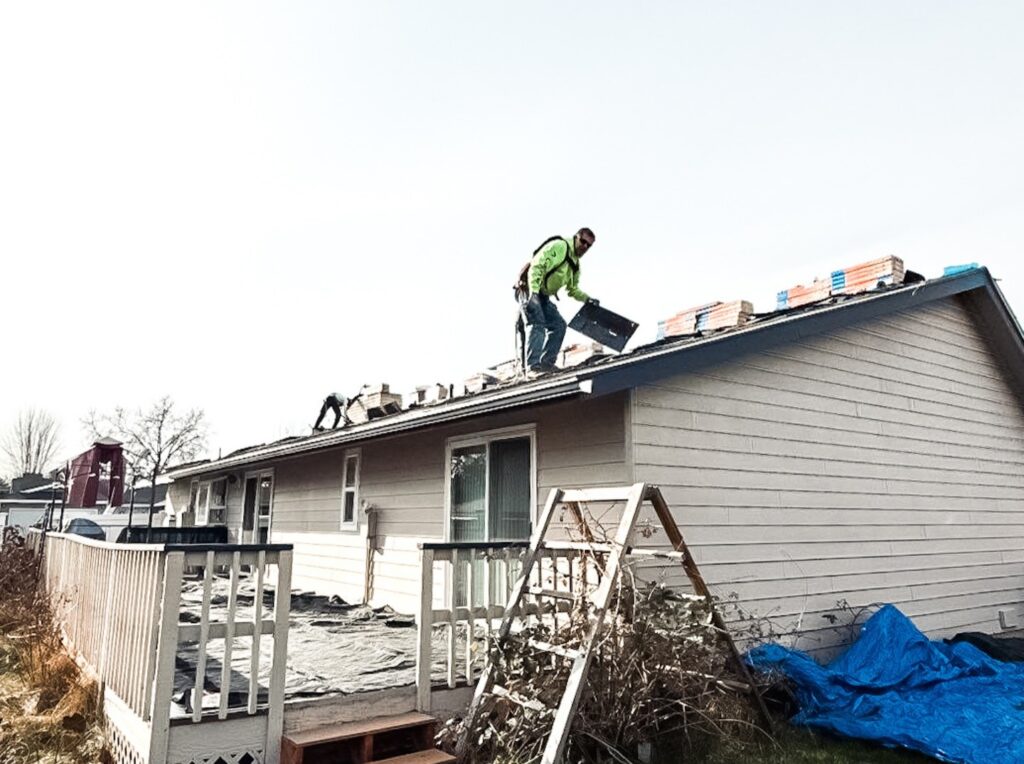 Alpine Roofing team working on a roof