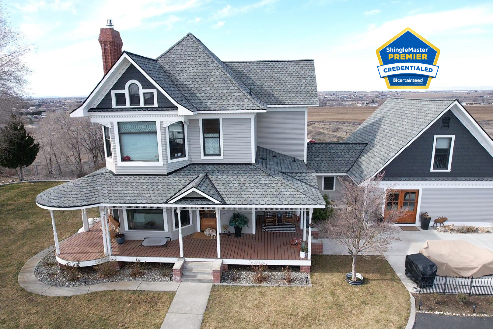 Alpine Roofing team installing a CertainTeed Landmark roof on a residential home.
