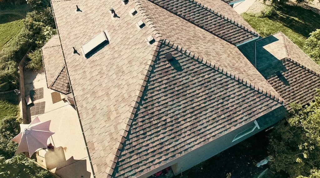 Aerial view of tan asphalt shingles