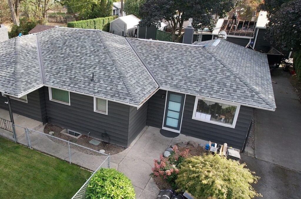 House with a light grey asphalt shingle roof
