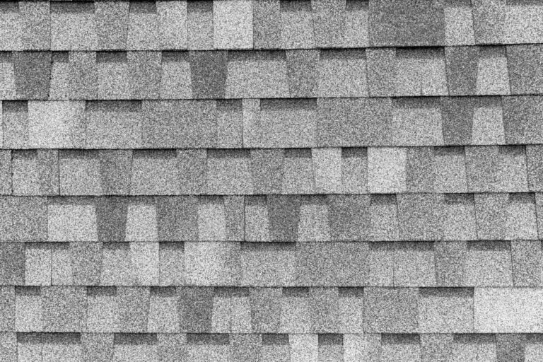 close-up of light grey asphalt shingles