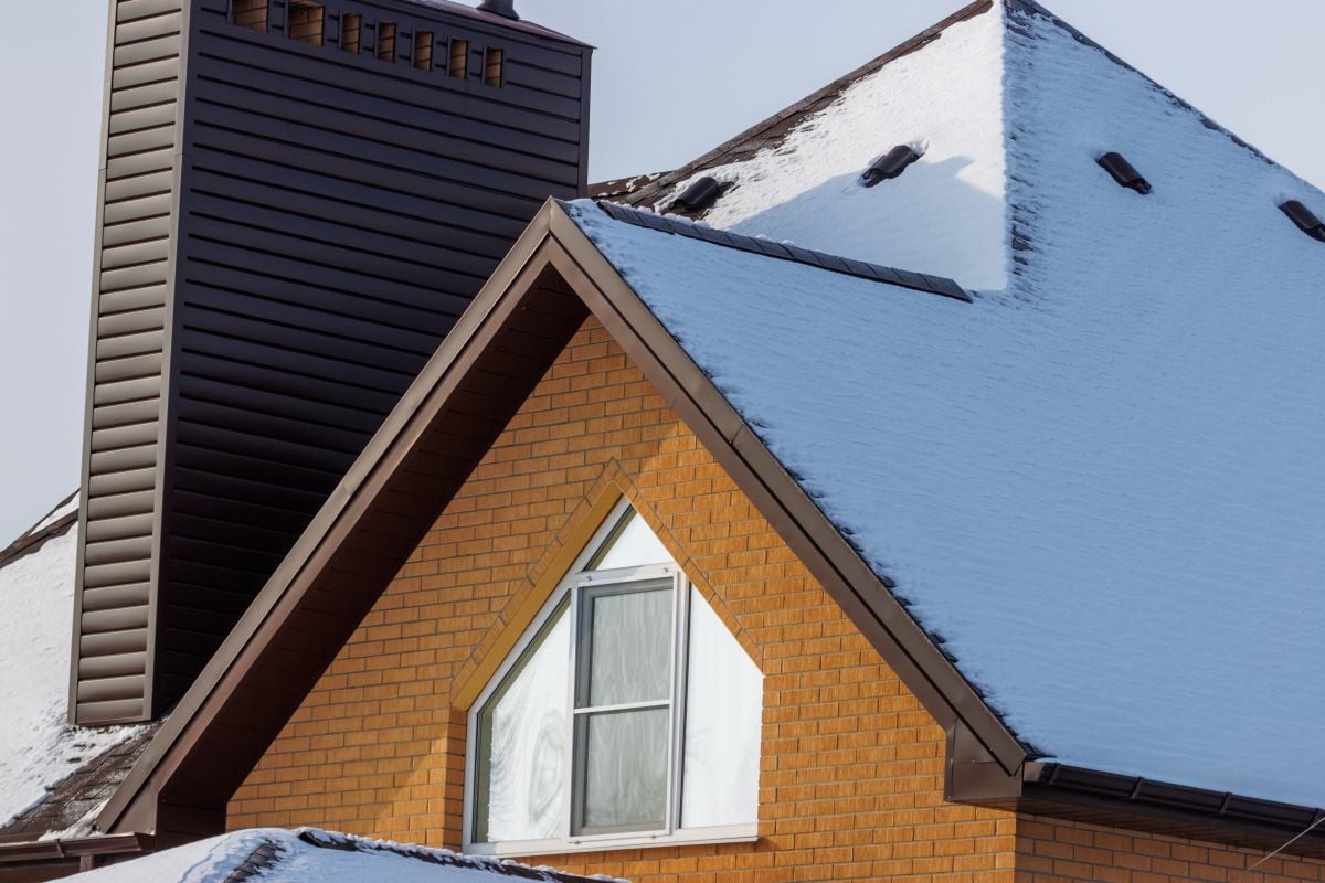 best roofing material for spokane climate snow on top of big house
