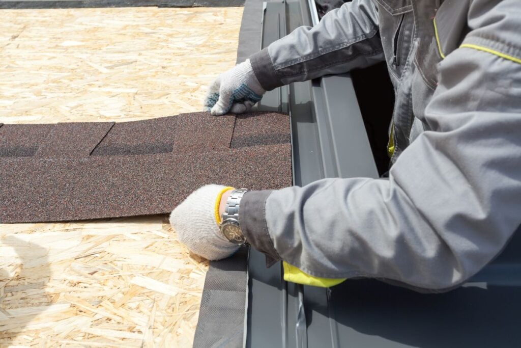 can i get a new roof in winter worker installing new asphalt shingles