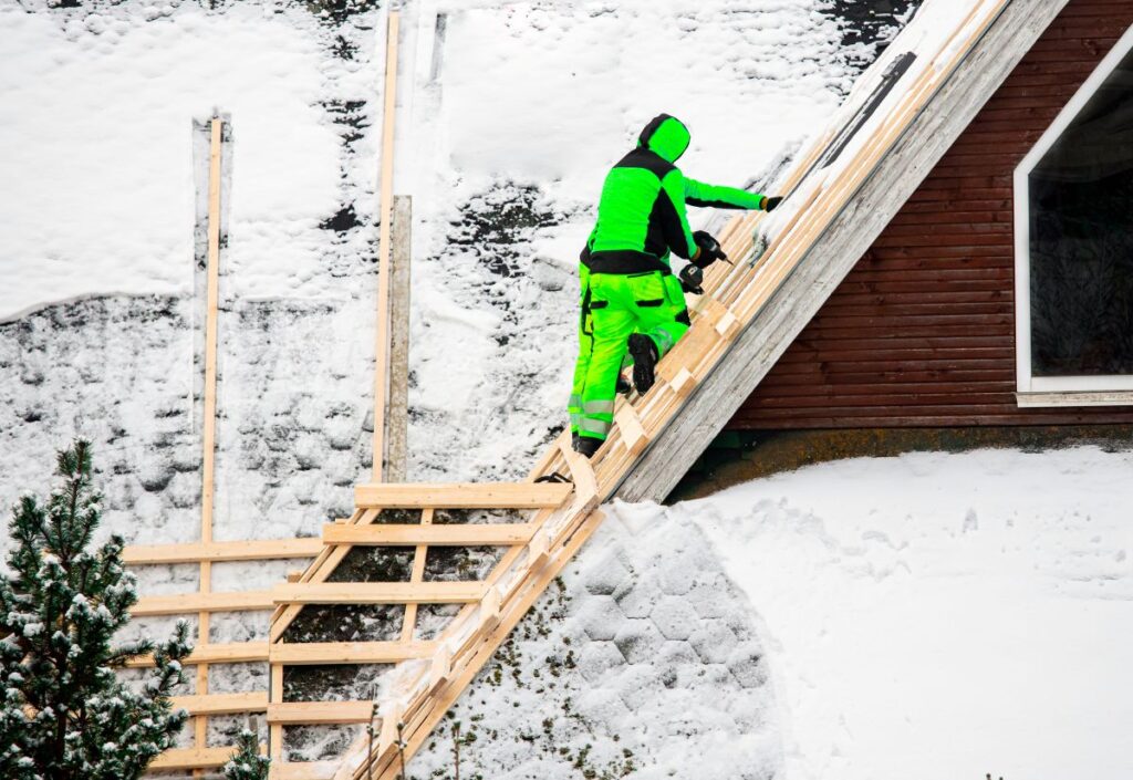can i get a new roof in winter worker using green uniform