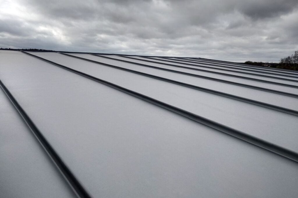 roof replacement cost Clarkston WA metallic sheet close up