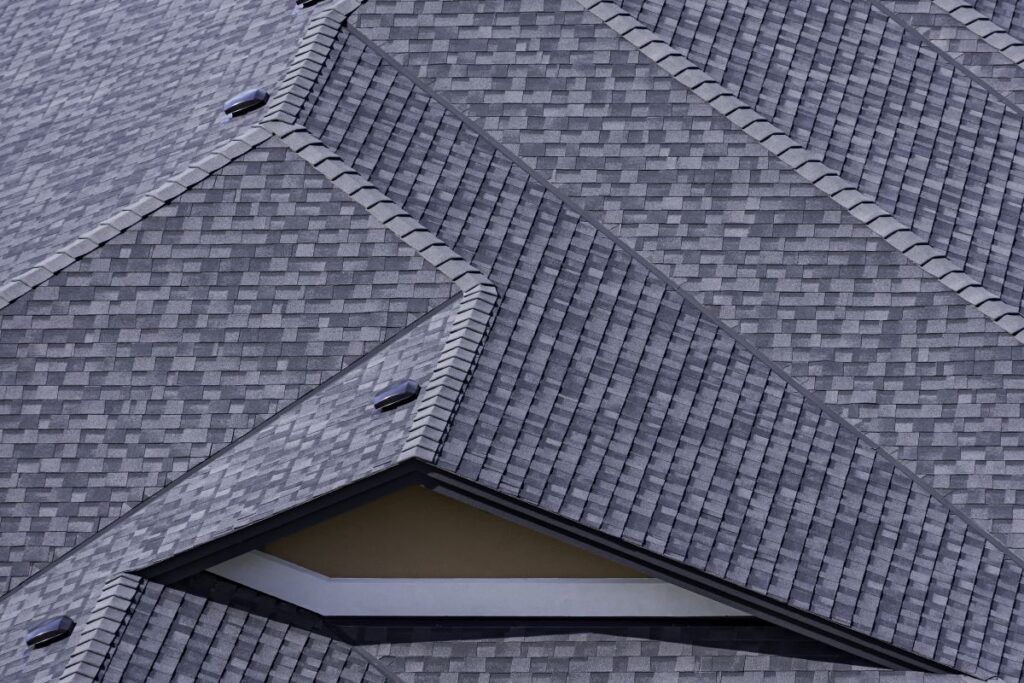 ridge cap shingles big roof huge house aerial view
