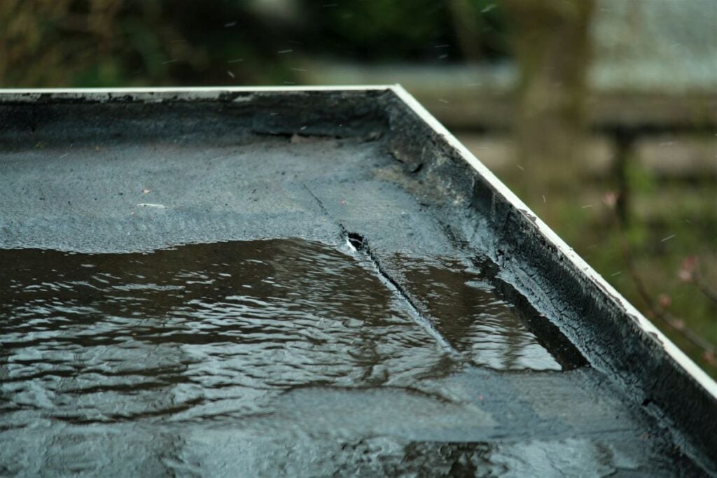 how to find a roof leak black bitumen water hole