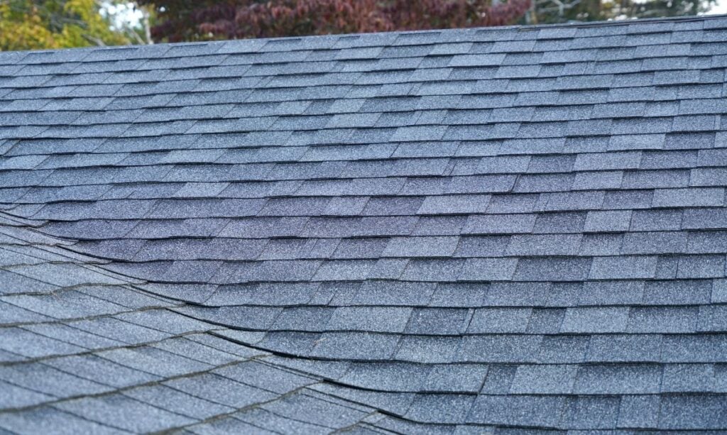 roof replacement cost Clarkston WA close up blue shingles