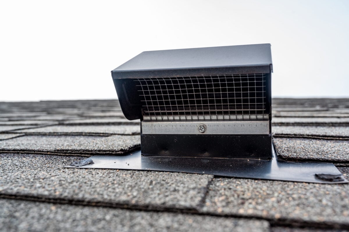 dryer vent on roof Static vent installed on a shingle roof for passive attic ventilation