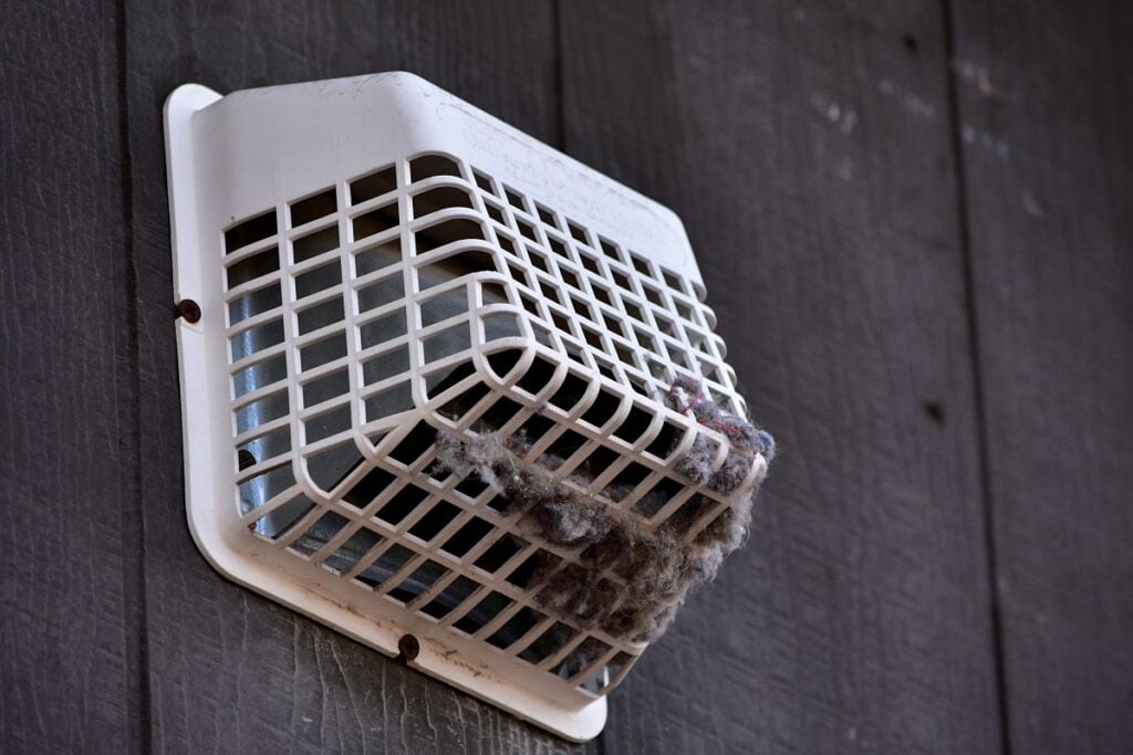 dryer vent on roof dirty and muddy