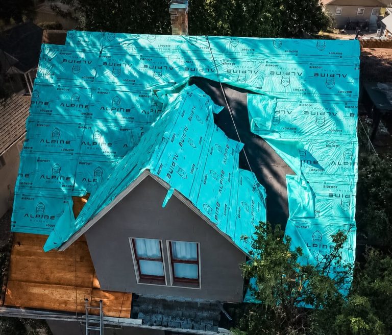 Roof replacement in progress, by the Alpine Roofing team